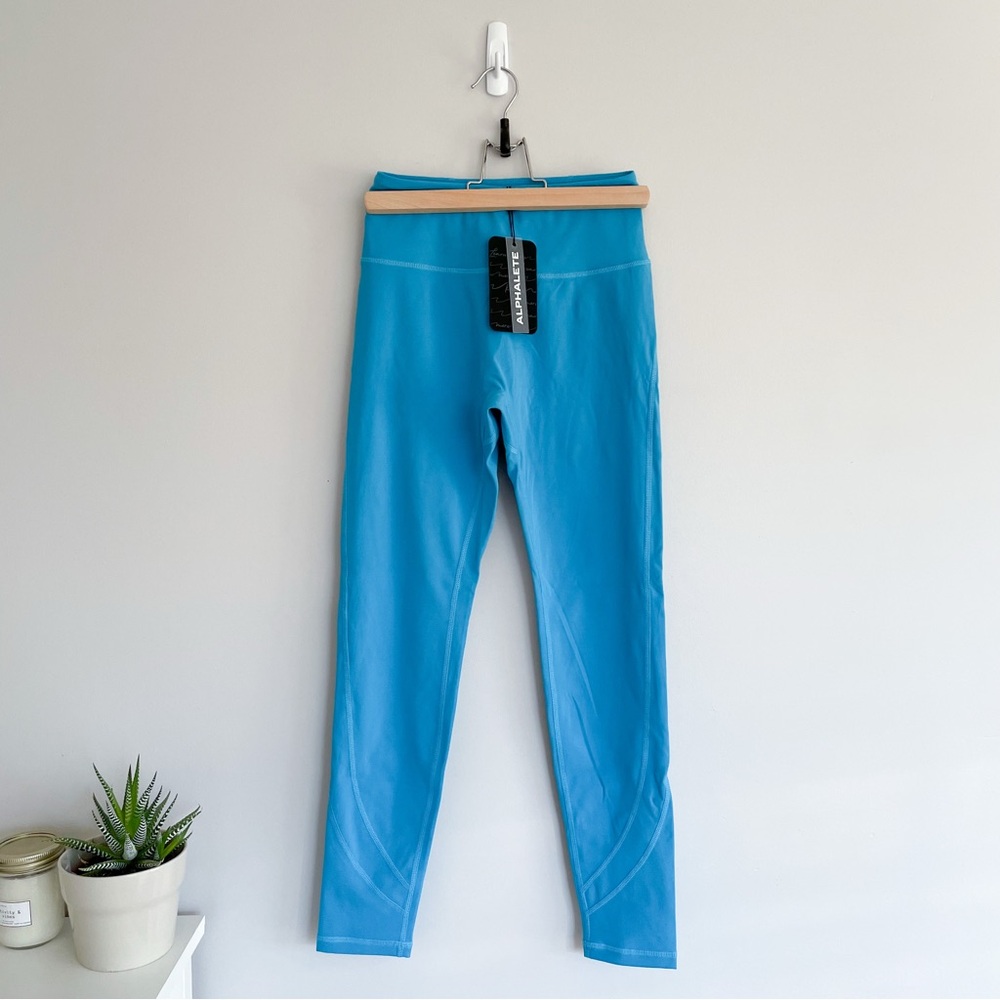 Alphalete | pulse surge leggings in blue, S